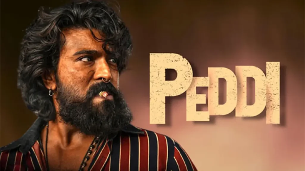 Bearded man with long hair in a striped shirt beside the title “PEDDI”.